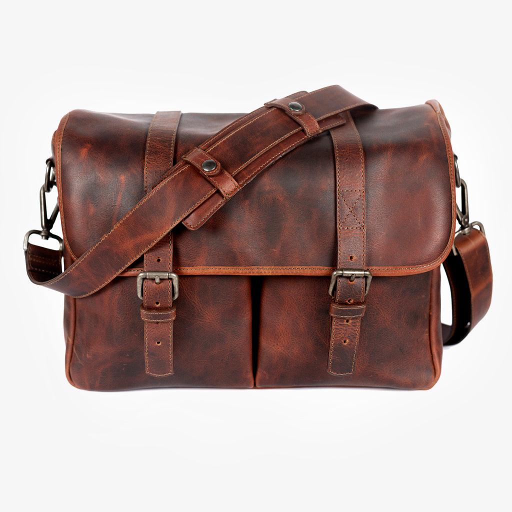 Voici la traduction en français :

**Sac à dos en cuir cognac pour appareil photo Roma** · image principale