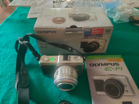 Olympus  Pen EP-12fd306b8-336a-4918-bf00-55052cbefef3